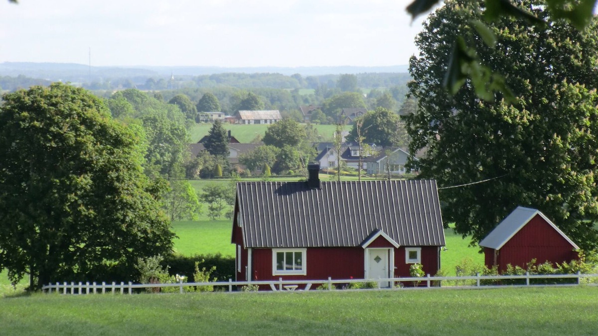Laholm Cottage | Charming red cottage on the Swedish countryside, near the sea and forest.