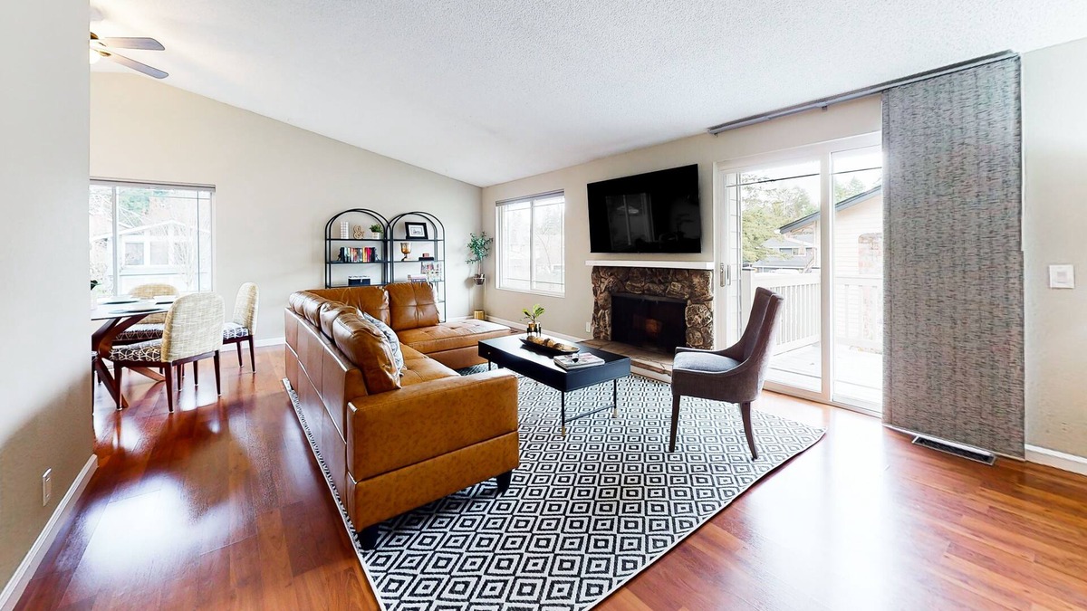 Bothell House | Charming retreat with a wood-burning fireplace, balcony, and a foosball table