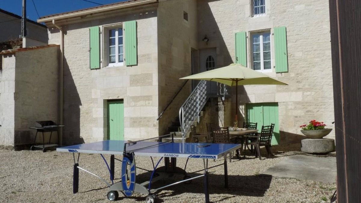 Asnieres-sur-Nouere Cottage | Charming Riverside Cottage with Terrace, Bikes, and Electric Car Charging