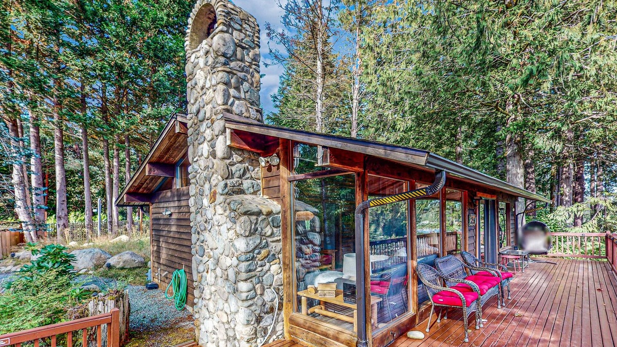 Gold Bar House | Charming riverfront cabin with hot tub, deck, mountain views and W/D