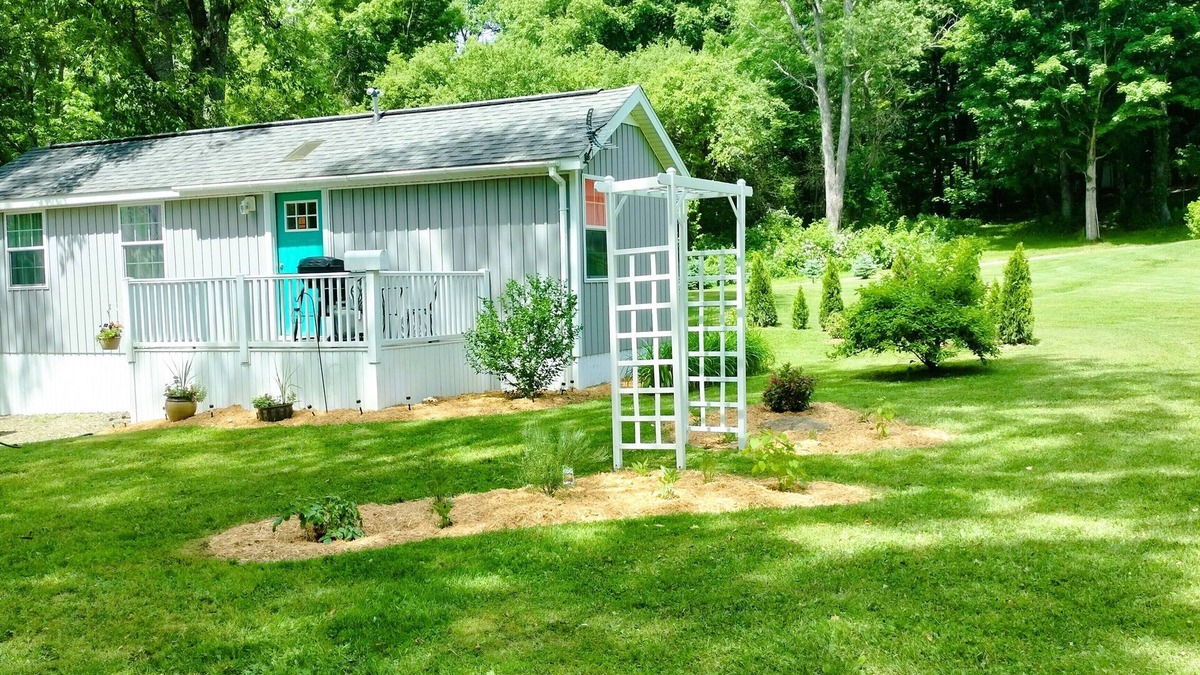 Cherry Creek Cottage | Charming Tiny Cottage in Serene Garden Setting – Perfect Country Getaway!