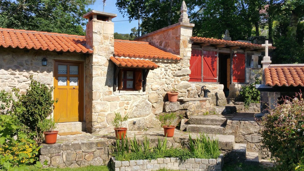 Poio Cottage | Charming traditional stone cottage nestled in the woods minutes from coast