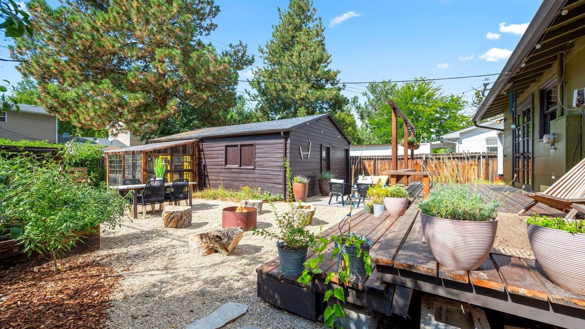 Depot Bench House | Charming Urban Ranch - garden oasis, fire pit in relaxing backyard