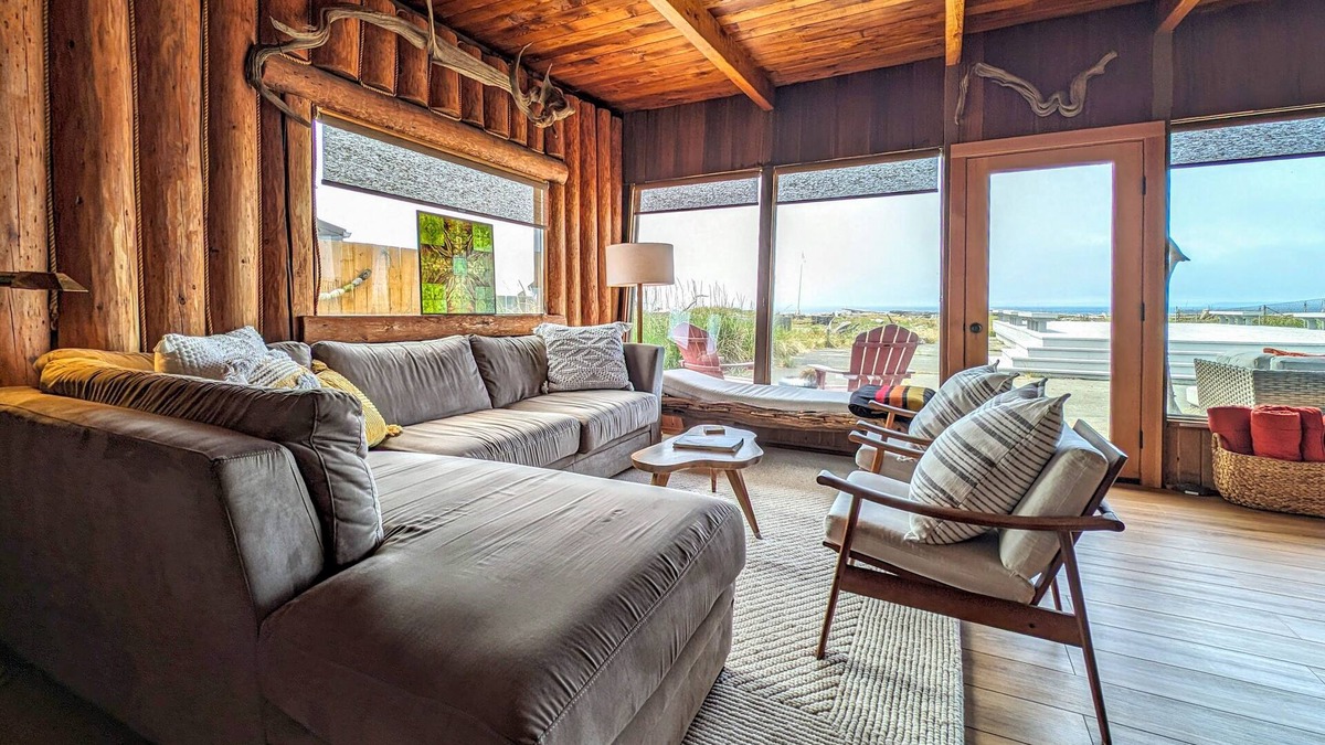 Oak Harbor House | Charming water view retreat with a wood-burning fireplace, deck, grill, and W/D