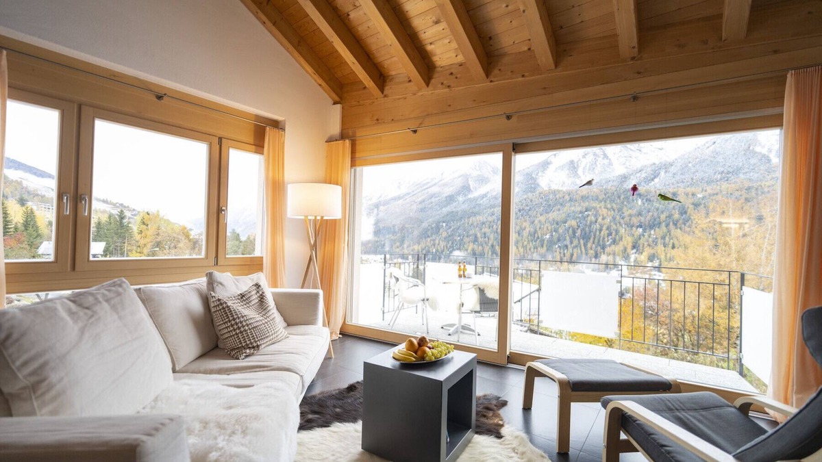 Engadin Scoul Apartment | Chasa Capricornin: modern and spacious attic apartment right next to the Motta Naluns mountain railroad