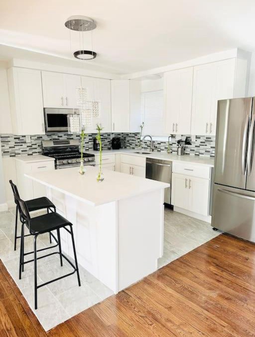 Elmont Apartment | Cheerful 4-bedroom home with free parking