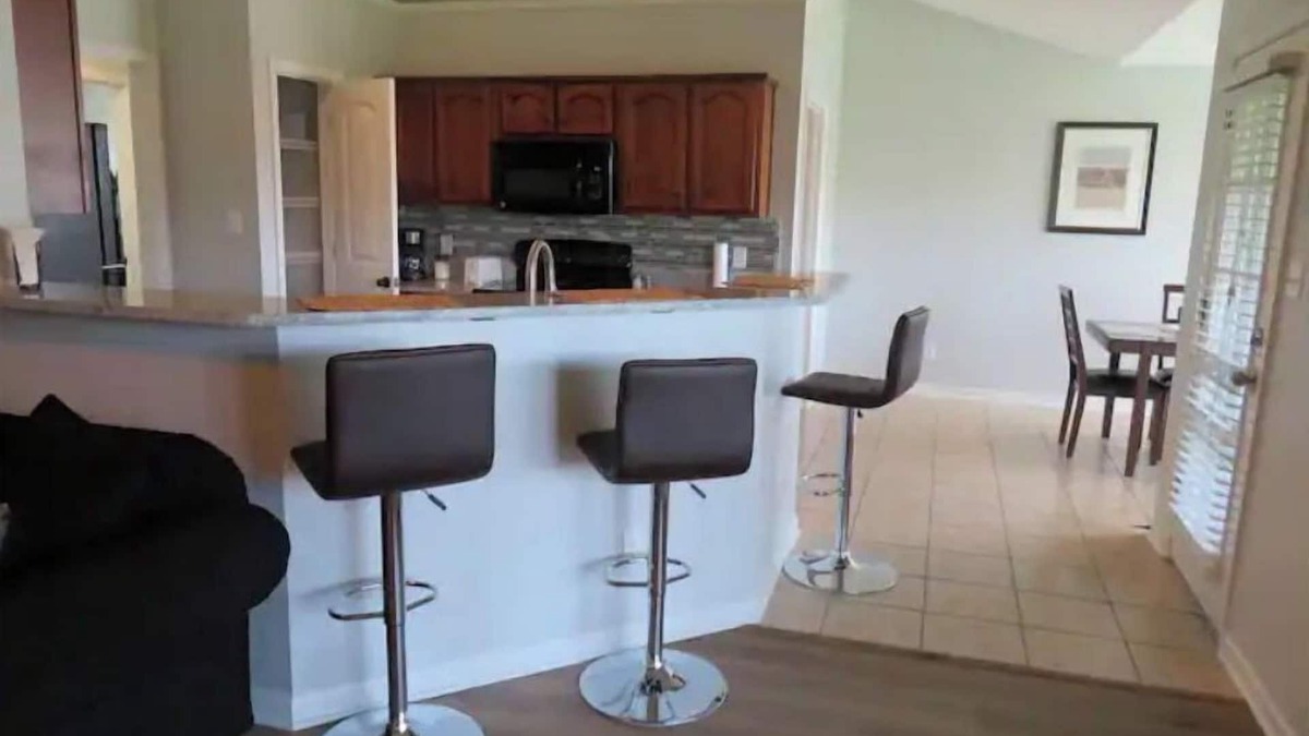 Southaven House | Cheerful 4 Bedroom with indoor fireplce, Fence in yard, Screen in back deck,