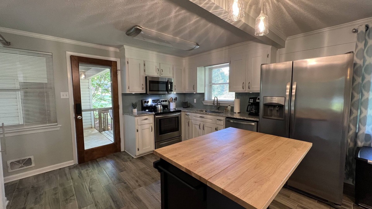 Newton House | Cheerful, relaxing ranch in quiet neighborhood with fire pit