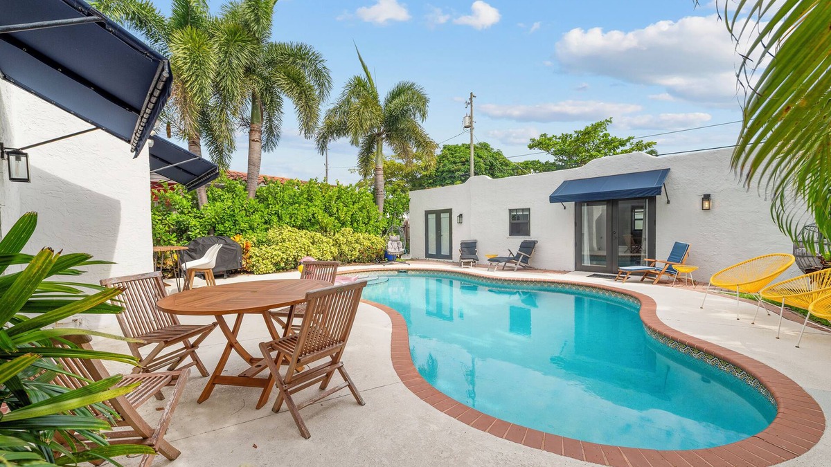 Old Northwood House | Chic 4BR retreat with private pool and modern amenities. Detached guest house includes queen bed, full bath, and kitchen. Minutes from downtown West Palm Beach, Palm Beach Island, Northwood Village, and Palm Beach Outlets.