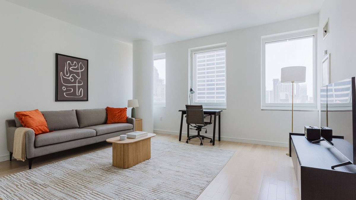 Central New York City Apartment | Chic Midtown 2BR w/Gym, W/D & A/C, near Rock Ctr, by Blueground