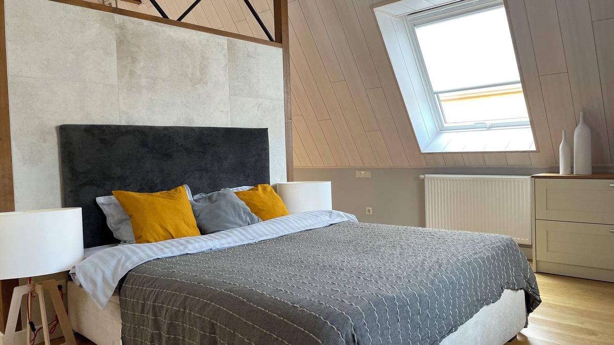 Pohja-Tallinn Apartment | Chic Old Town Apartment with Soaring Ceilings and Modern Comforts