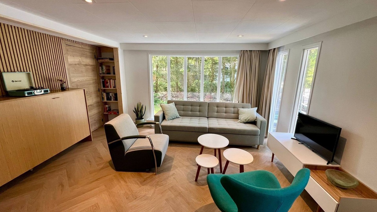 Municipality of Elburg Ski Chalet | Child-friendly holiday home near a pool and playground in the forests of Veluwe