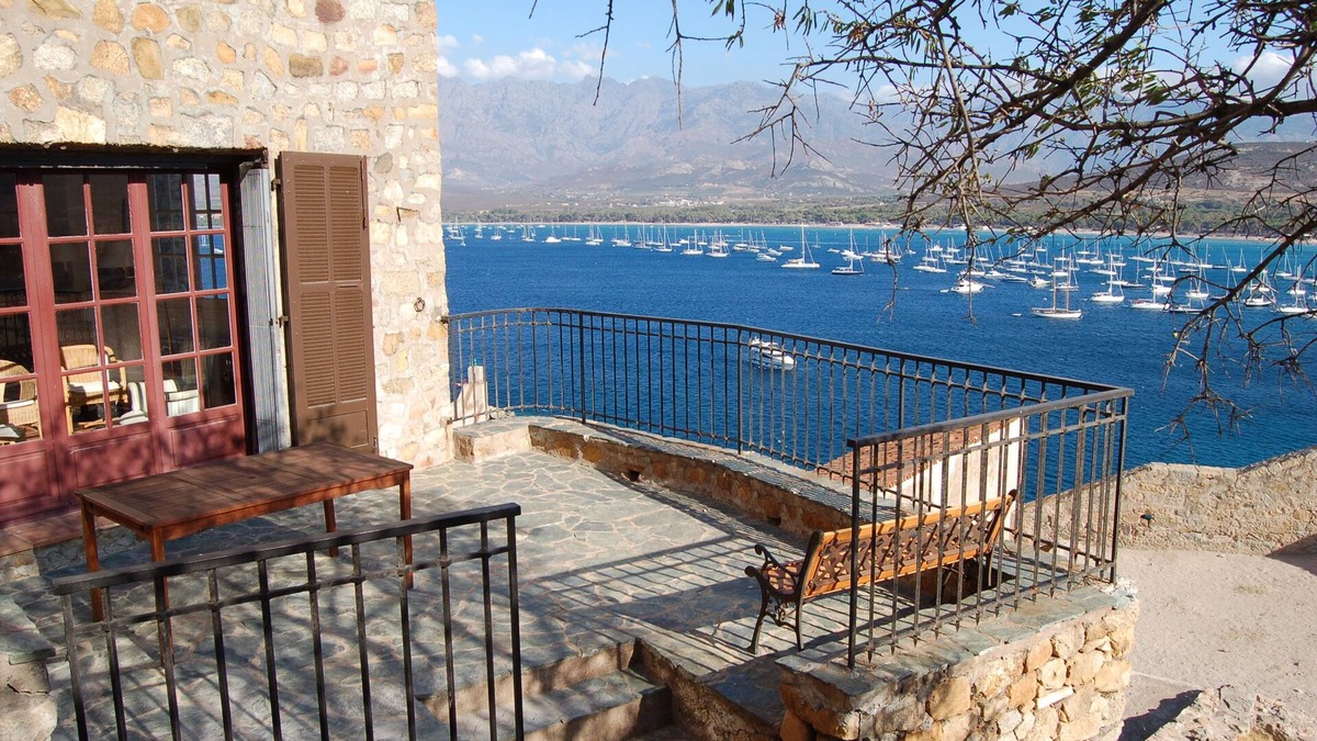 Calvi House | citadel house with garden overlooking sea and mountain.