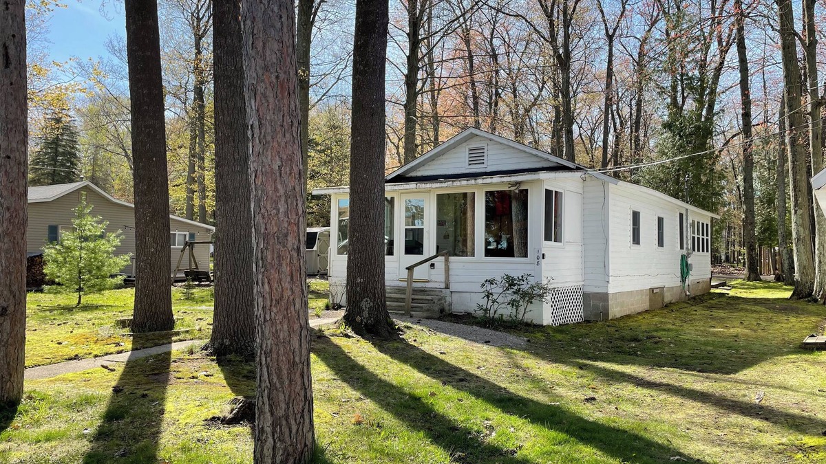 Tawas City House | Classic and Affordable Lake Home, WWII Display, Canoe, Deck, Quiet Neighborhood