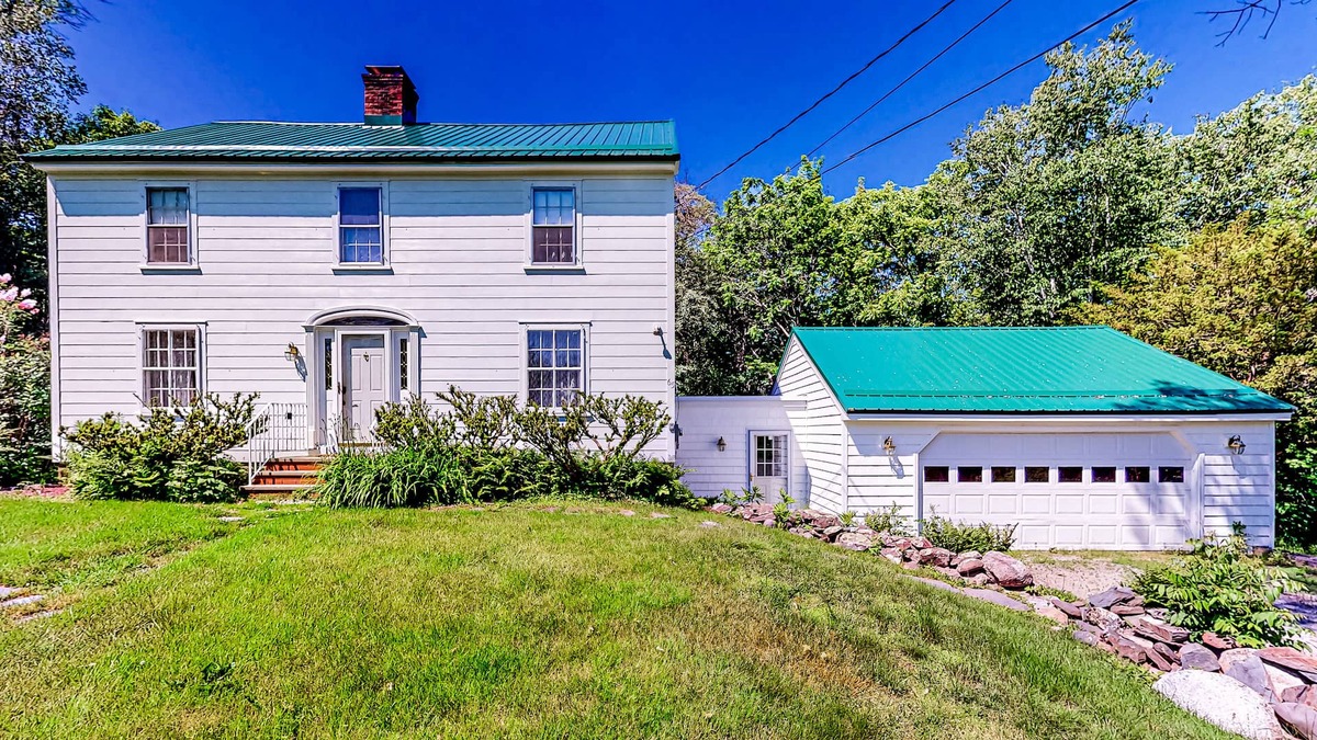 Orono House | Classic waterfront retreat with a grill, firepit, four bedrooms, W/D, and AC