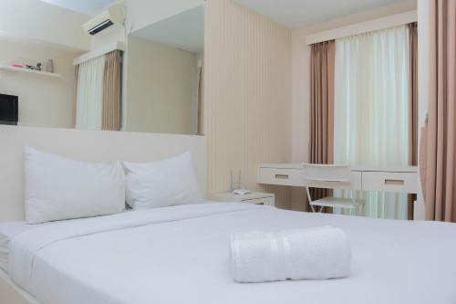 Bekasi Timur Apartment | Clean Studio Apartment at Grand Dhika City By Travelio