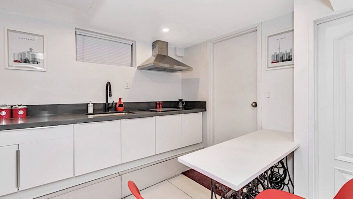 East Danforth House | Clean, white, bright and close to Woodbine subway