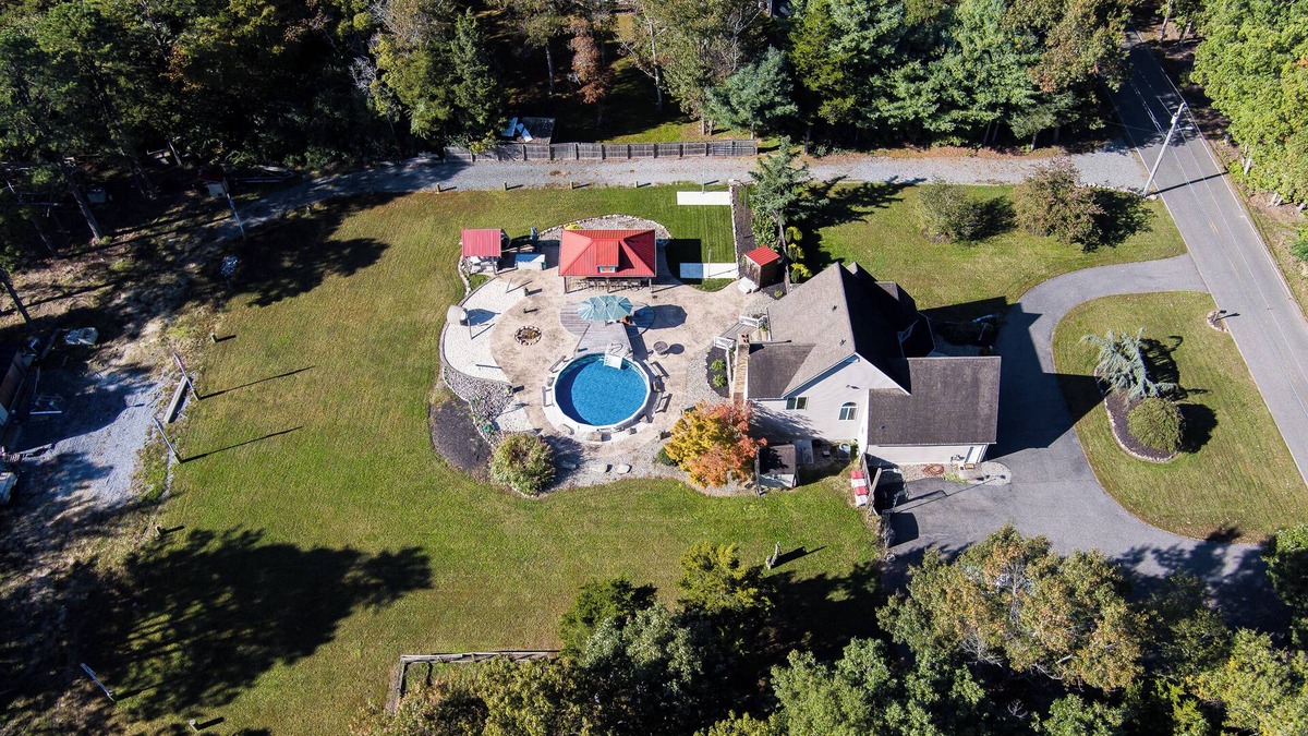 Milmay Other | ClubDivot - A Modern Farm Style Home with Pool and Backyard Bar