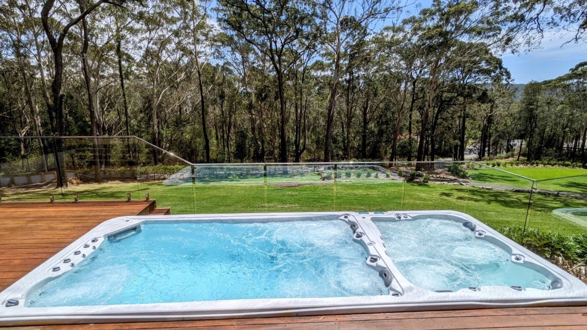 Kincumber South House | Coastal bush retreat> Space,Nature,Relaxation, Dual swim spa and fireplace