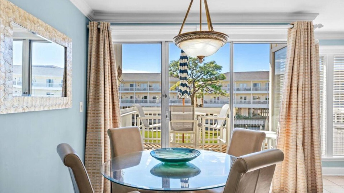 Holiday Isle Condo | Coastal Charm! Sandpiper Cove 1033,walk to beach, Canal Front, bring your boat!🌴