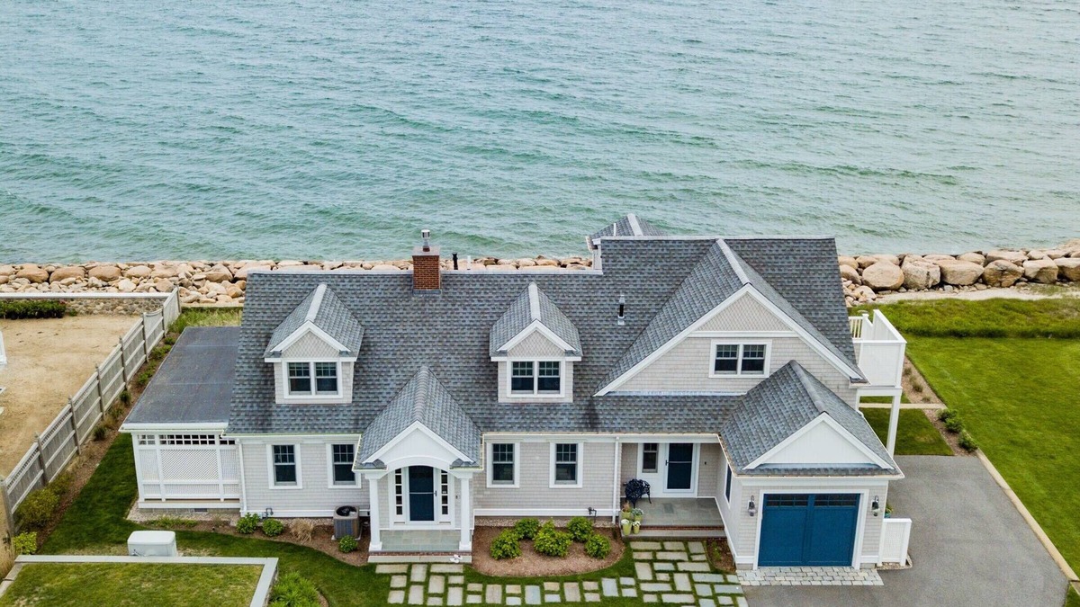 East Falmouth House | Coastal chic meets French Provençal in this newly renovated oceanfront home.