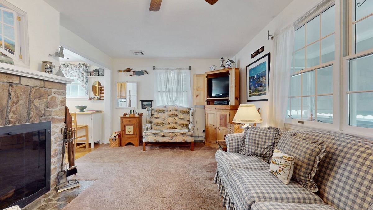 Pocasset House | Coastal dog-friendly cottage near Hen Cove with sunroom, beach access, & games