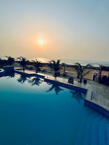 Prampram Hotel | Coconut Pointe Villa & Beach Resort