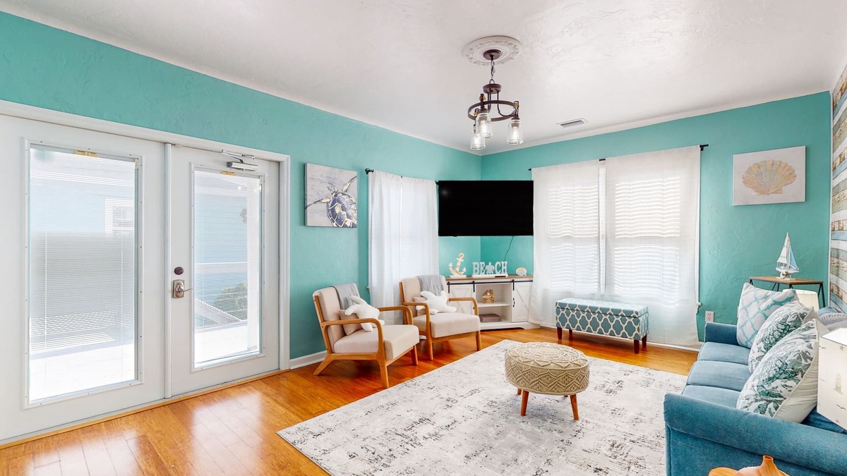 East Daytona House | Colorful charmer with ocean views, deck, & dog-friendly yard - snowbird-friendly