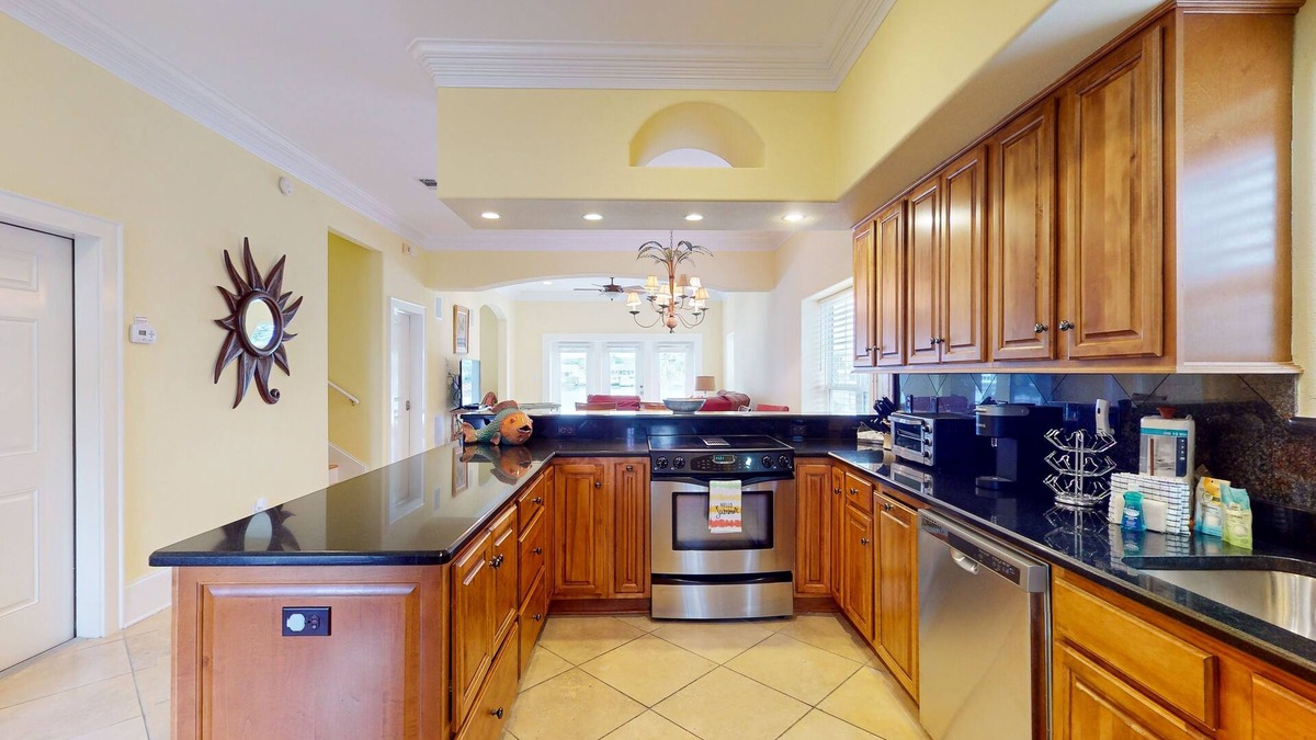 Sunset Pass House | Colorful end unit townhome with resort amenities, sound views, W/D, & AC
