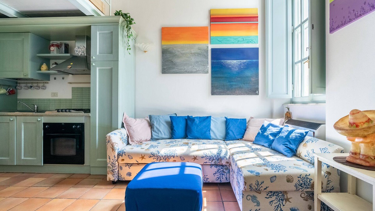 Calambrone Apartment | Colors House On The Beach by Pleiades Home