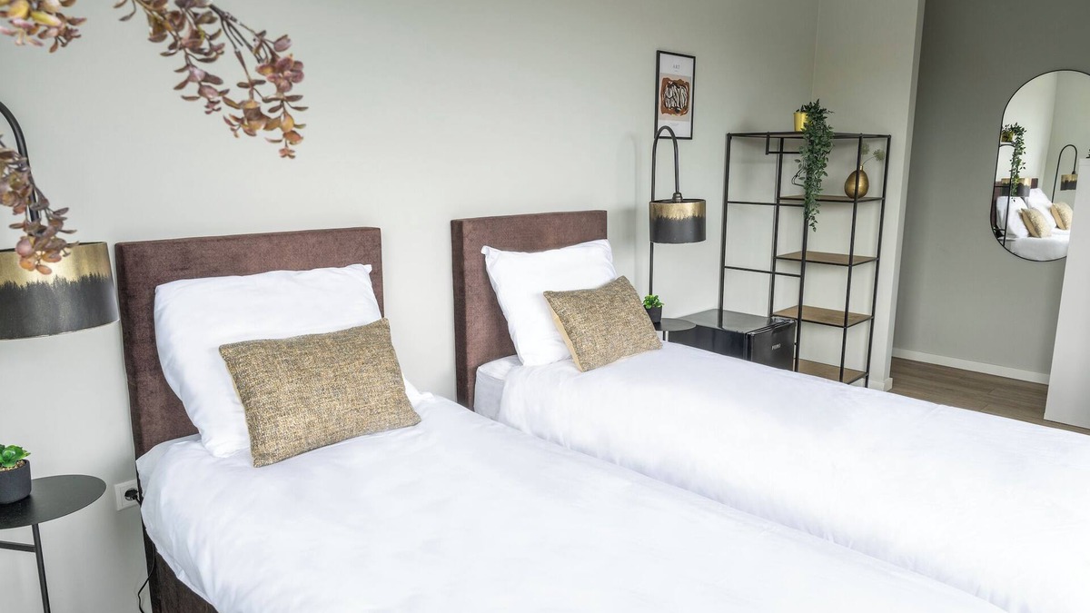 Raamsdonksveer Apartment | Combined rooms, 12 beds, kitchen, and free parking