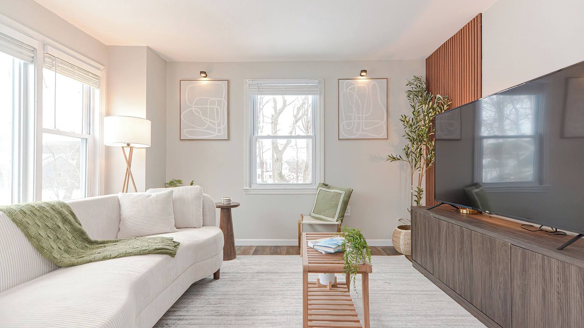 Lowell Apartment | Comfort Oasis with Private Garage. Steps from UMass Lowell & 35 min from Boston