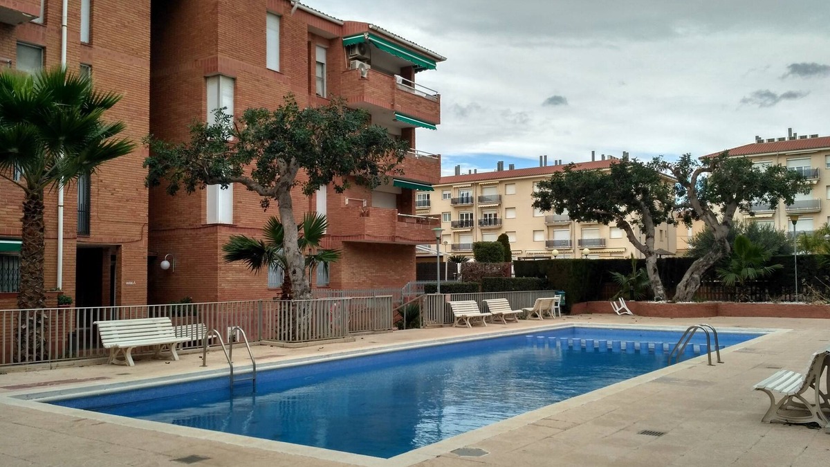Comarruga Apartment | Comfortable apartment, Wi-Fi A/C and pool.