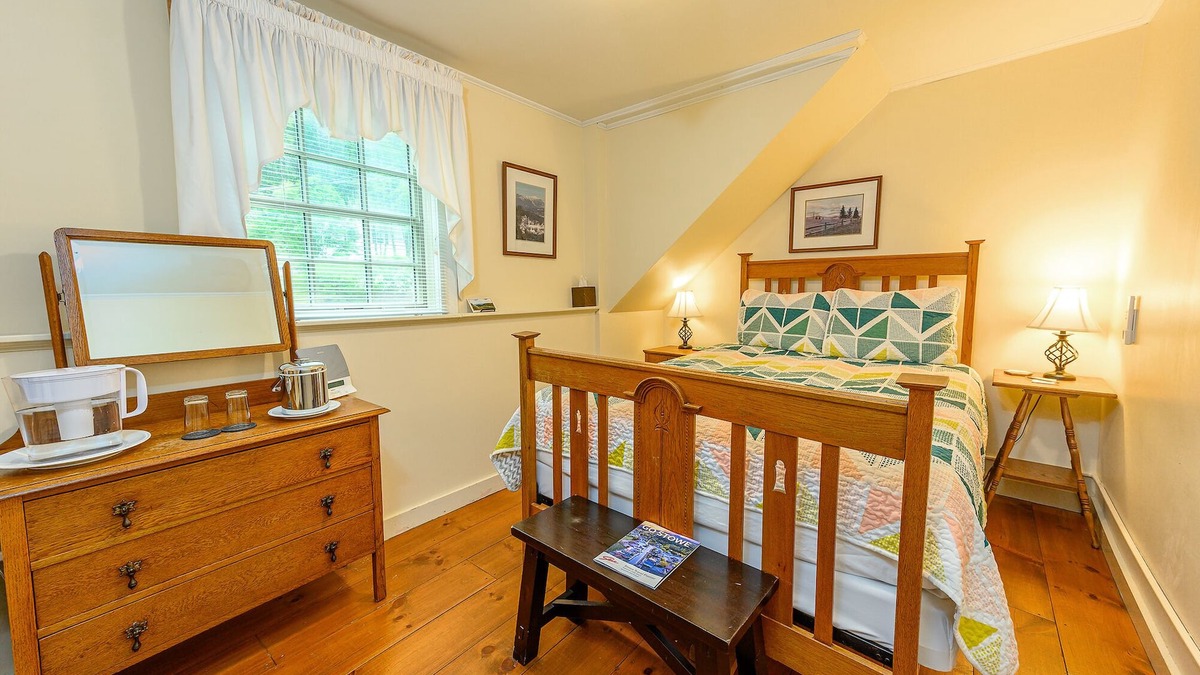 Stowe Bed & Breakfast | Comfortable budget room with queen bed, street view, and all-glass shower stall with full service breakfast included