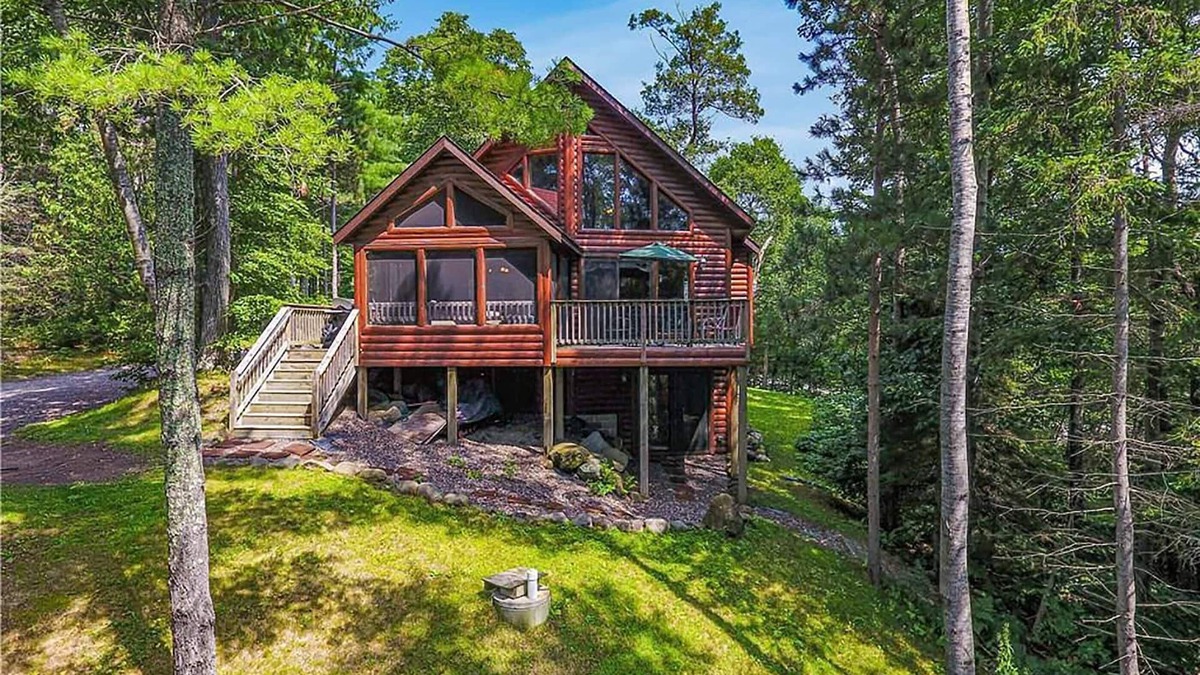 Hayward Cabin | Comfortable lake home with sandy beach and private dock on LCO Lake