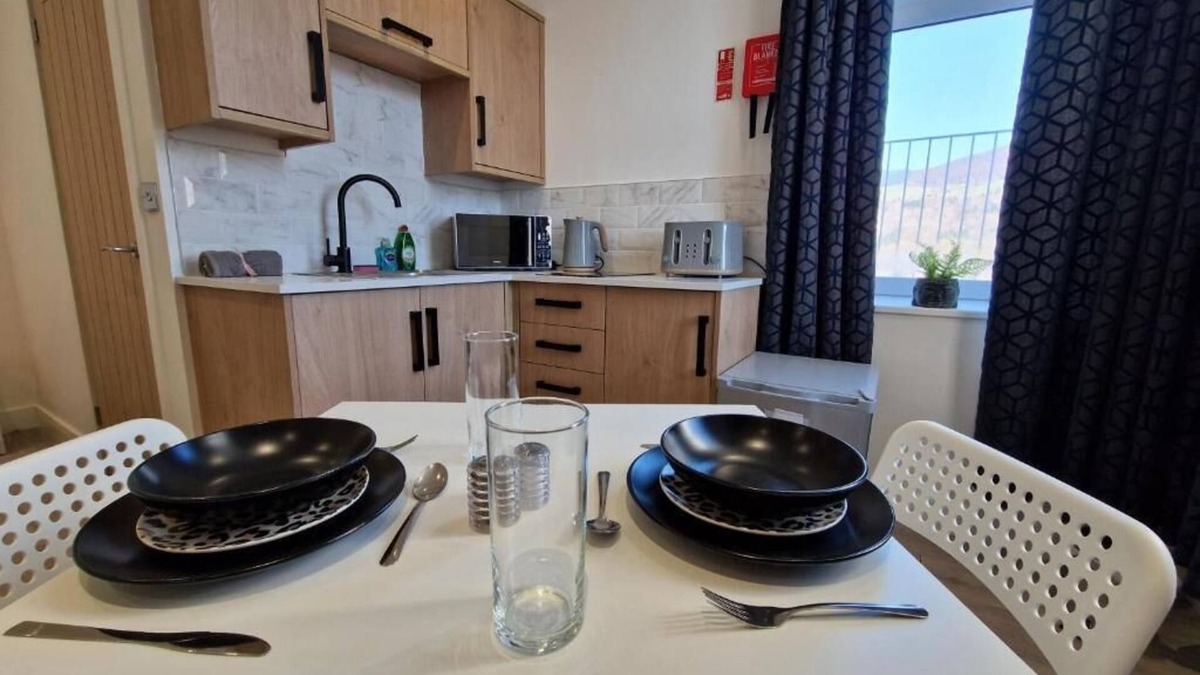 Mountain Ash Apartment | Comfortable Living Space: Flat 2 offers a modern studio apartment
