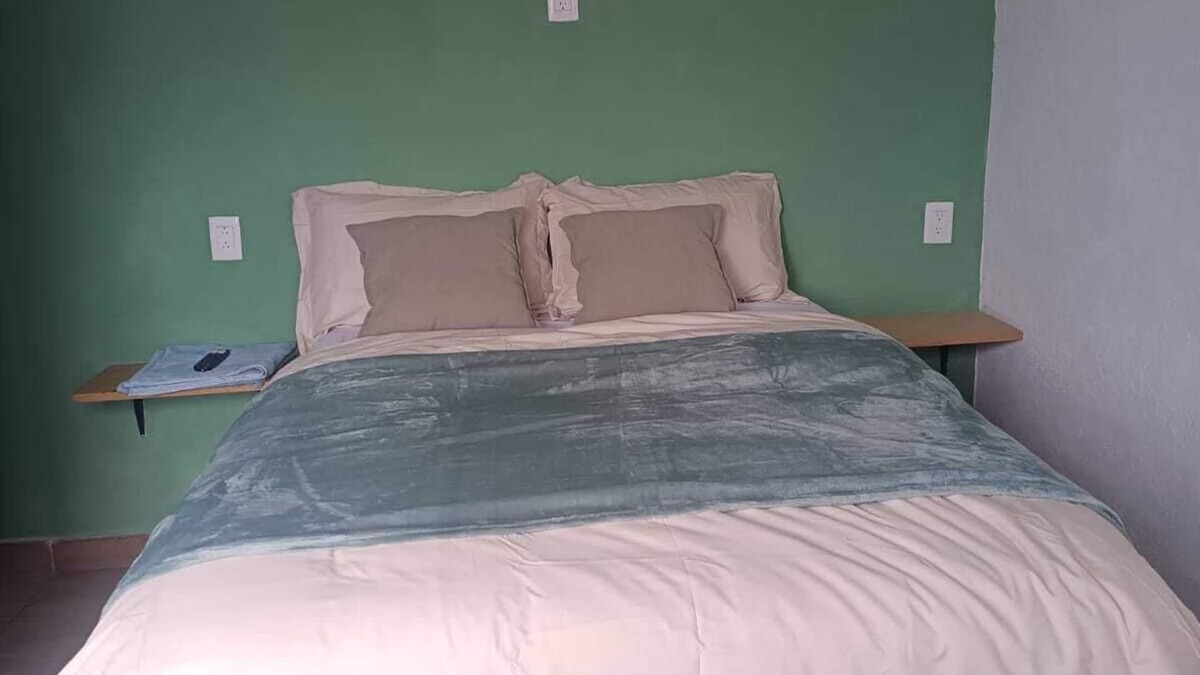 Queretaro Apartment | Comfortable room with private bathroom next to plaza candiles in Querétaro