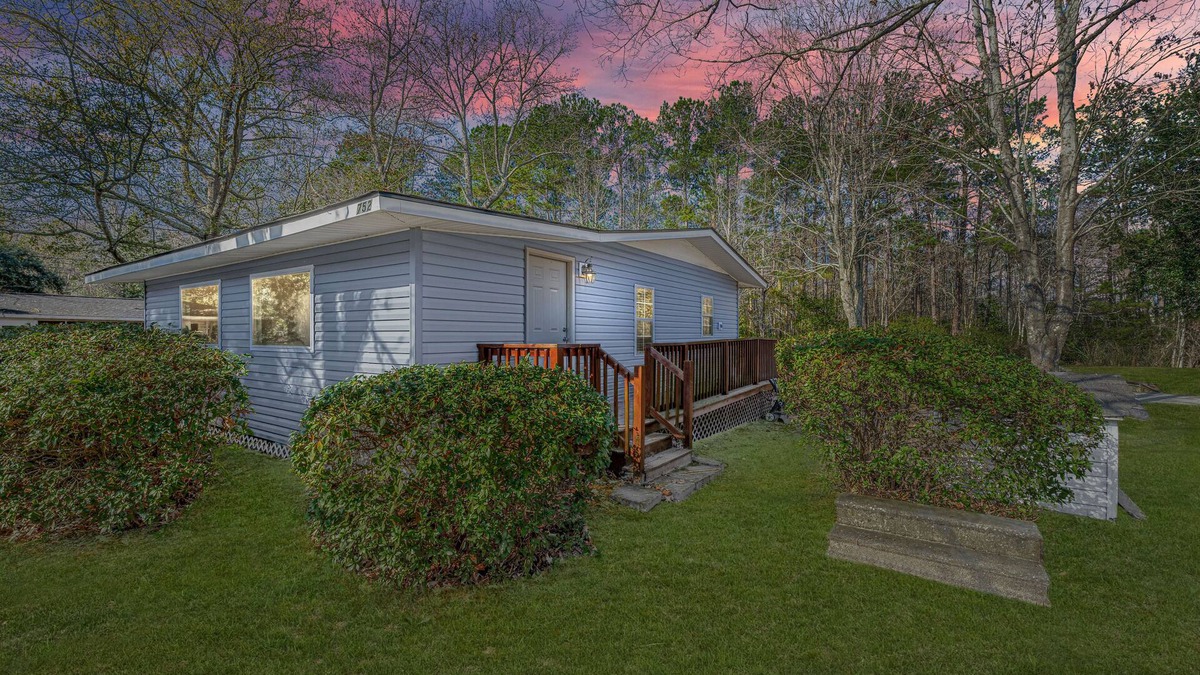 Moncks Corner Cottage | Completely renovated lake house with boat landing, dock, fire pit and deck!