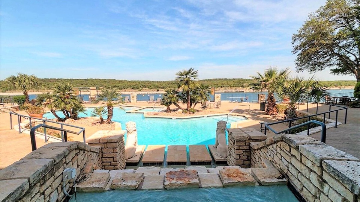 Lago Vista Condo | Condo on Private Island on Lake Travis with Pools, Hot Tubs, Tennis Courts, Gym, Kayaks Included