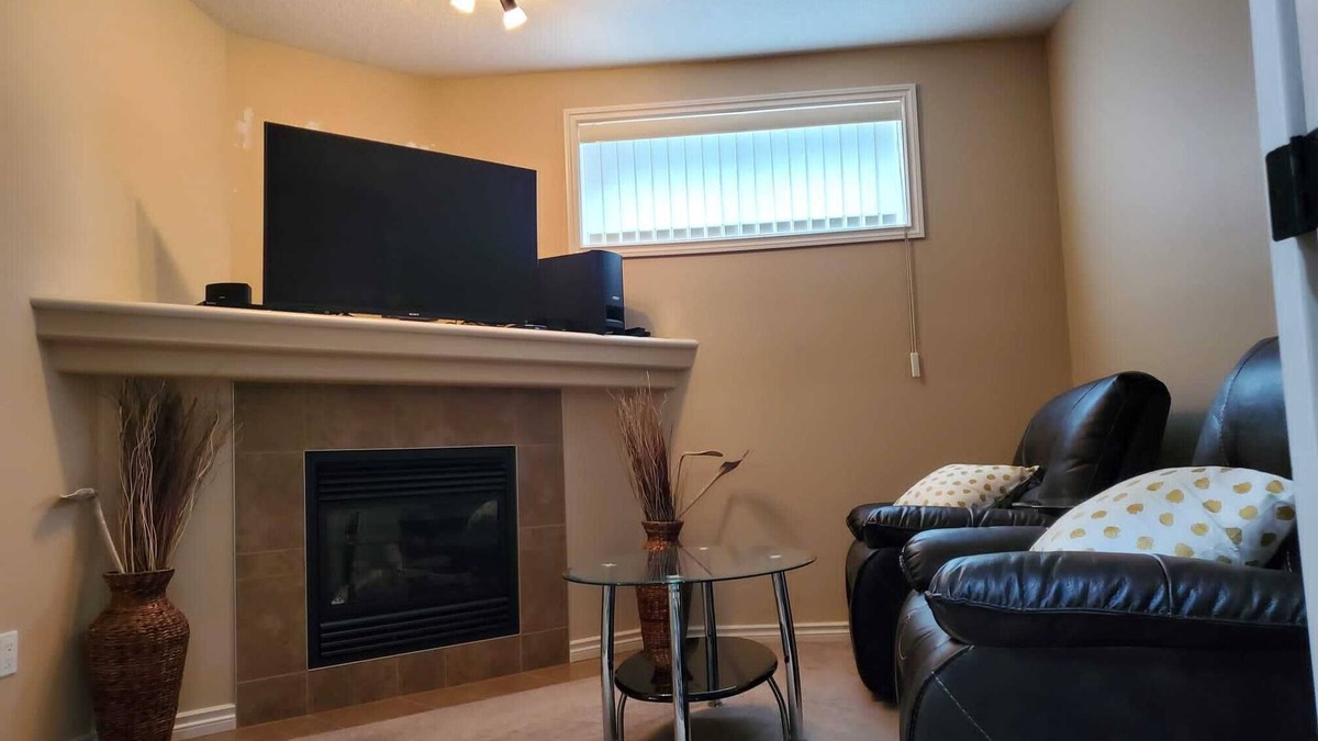Southeast Edmonton House | Contemporary & Cheerful 1-Bedroom Suite with Fireplace