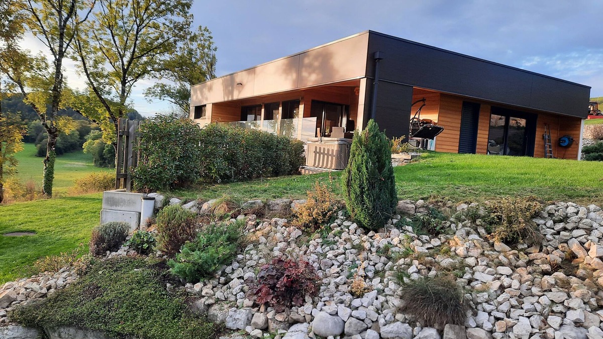 Entre-Deux-Monts House | Contemporary home with jacuzzi overlooking nature