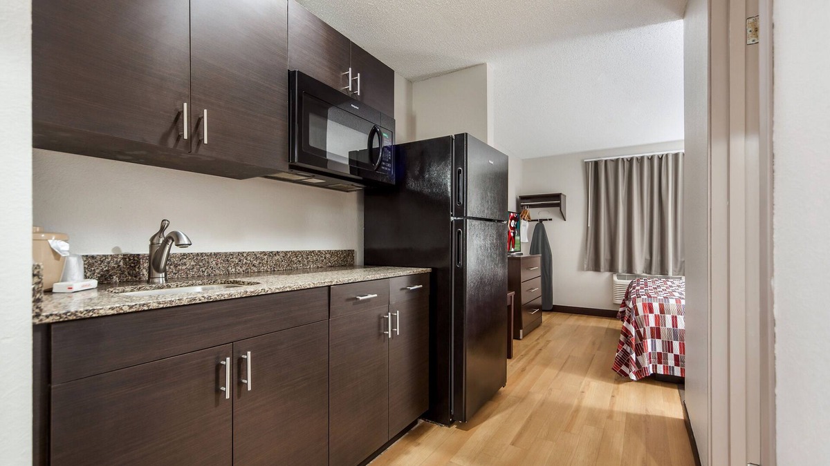 Council Bluffs Hotel | Convenient Stay, Superb Location! 2 Budget-friendly Units with Kitchenettes