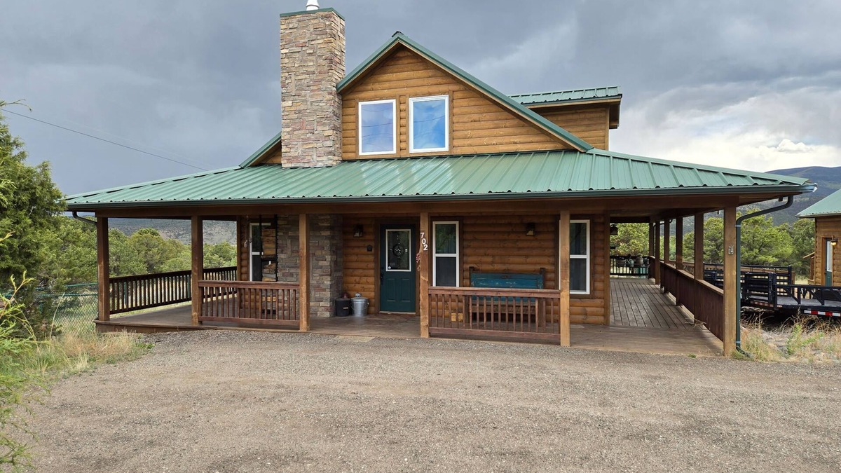 Alpine Village Cabin | Conveniently located cabin with full kitchen, w/d, large deck & great views