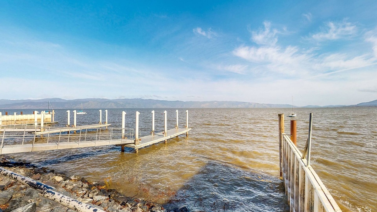 Lakeport House | Corner Lot Carriage House with Storybook Yard