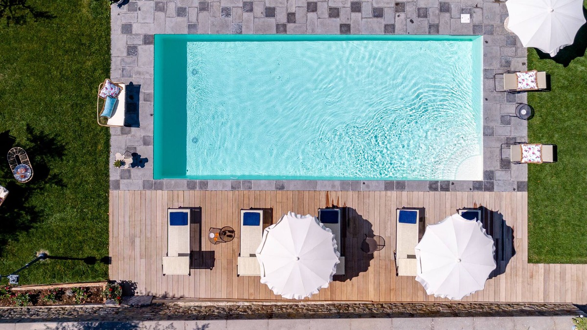 Cortona Villa | Corte della Luna, elegant villa with swimming pool surrounded by a suggestive olive grove