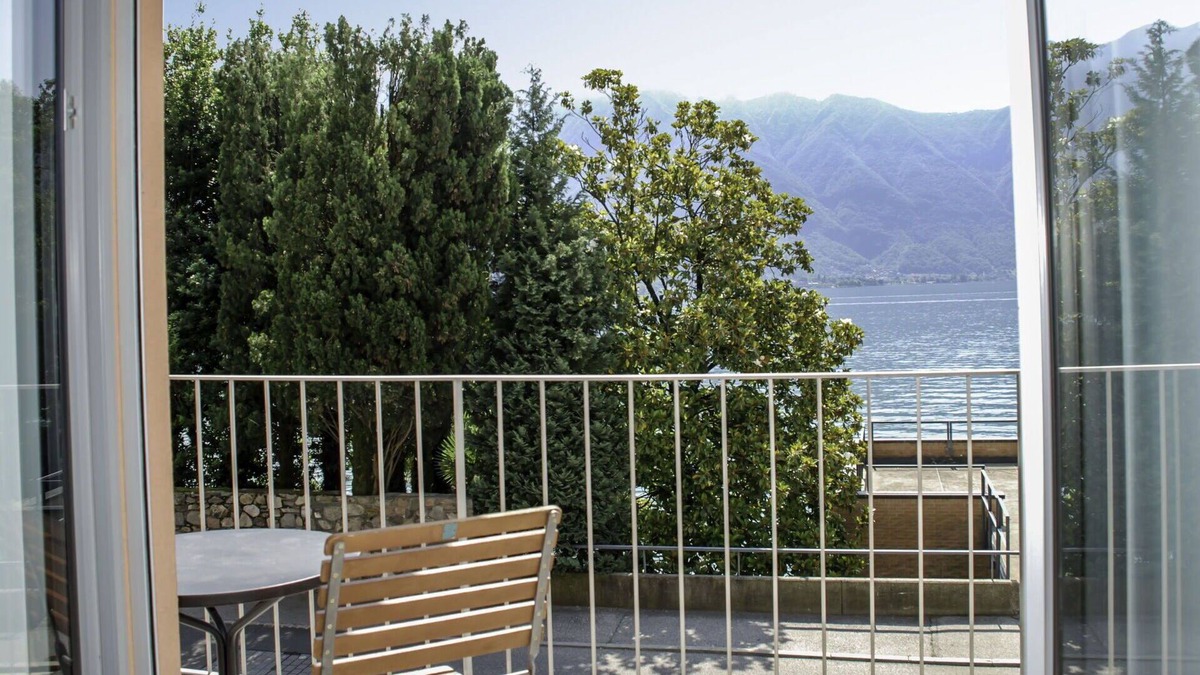 Melide Apartment | Cosy apartment for 2 guests with WIFI, TV, terrace, pets allowed, panoramic view and parking