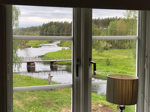 Kvillsfors Cabin | Cosy river house