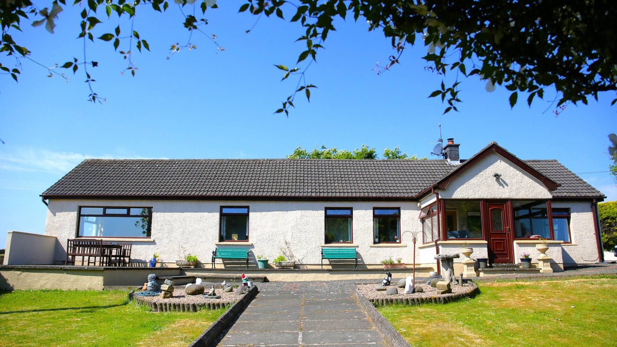 Carrickfergus House | Cosy, spacious, private hill top property, with stunning far reaching views.