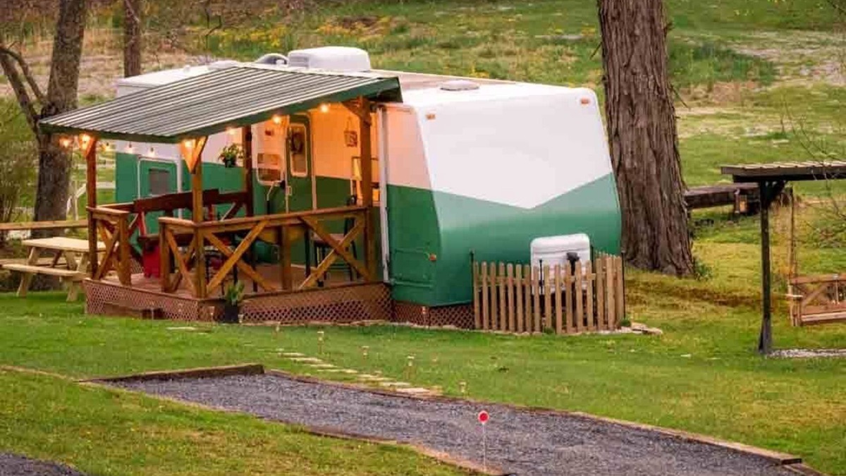 Canvas House | Cotch under a sugar maple tree w/firepit, swing and outdoor shower