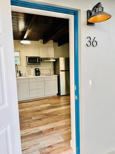 Tavares House | Cottage 36, Sunshine Suite - Dora Canal Court - a downtown, waterfront community